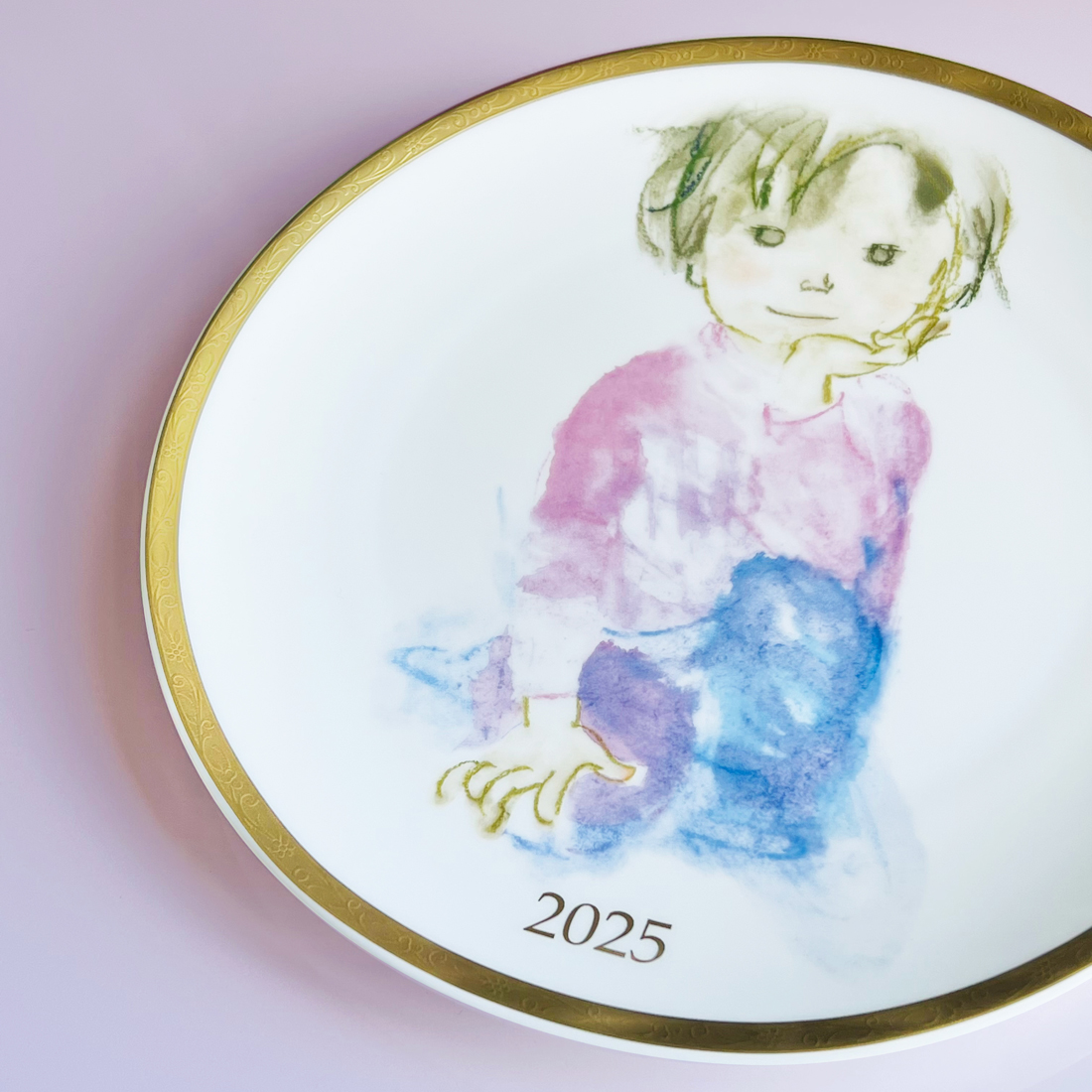 2025立てひざの少年